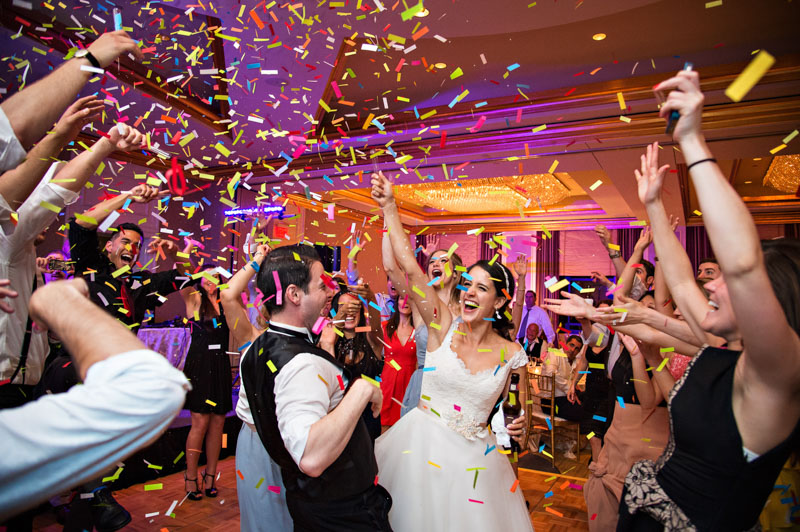 wedding-party-at-recpetion-with-confetti.jpg