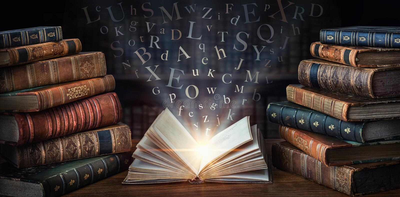 old-book-flying-letters-magic-light-background-bookshelf-library-ancient-books-as-symbol-knowledge-history-218640948.jpg