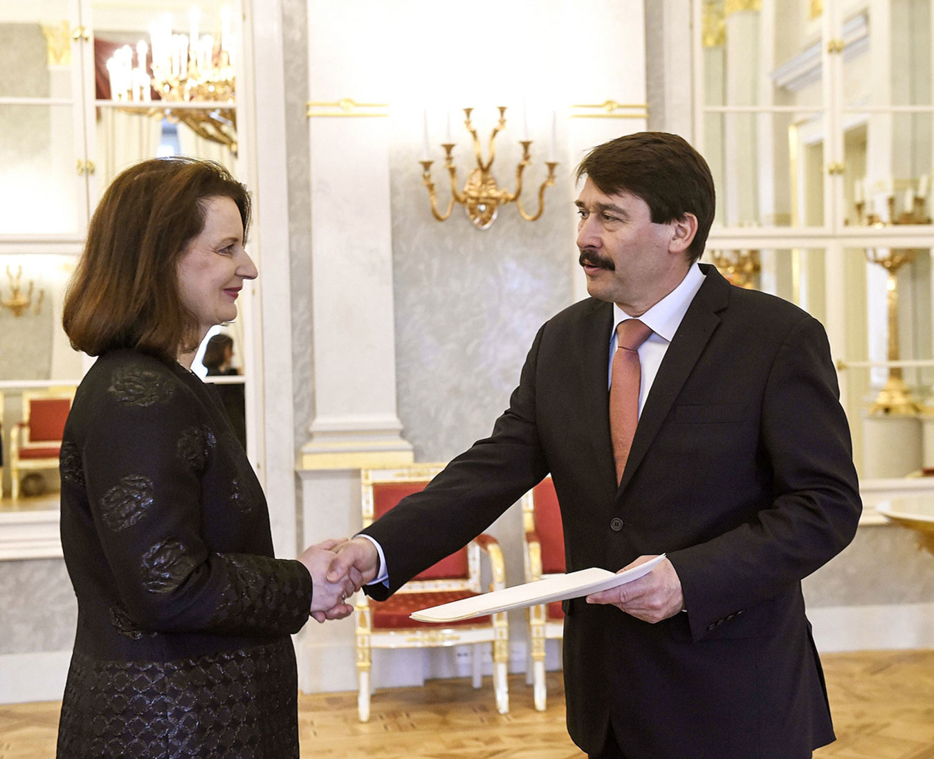 a-elisabeth-ellison-kramer-presenting-credentials-president-ader.jpg