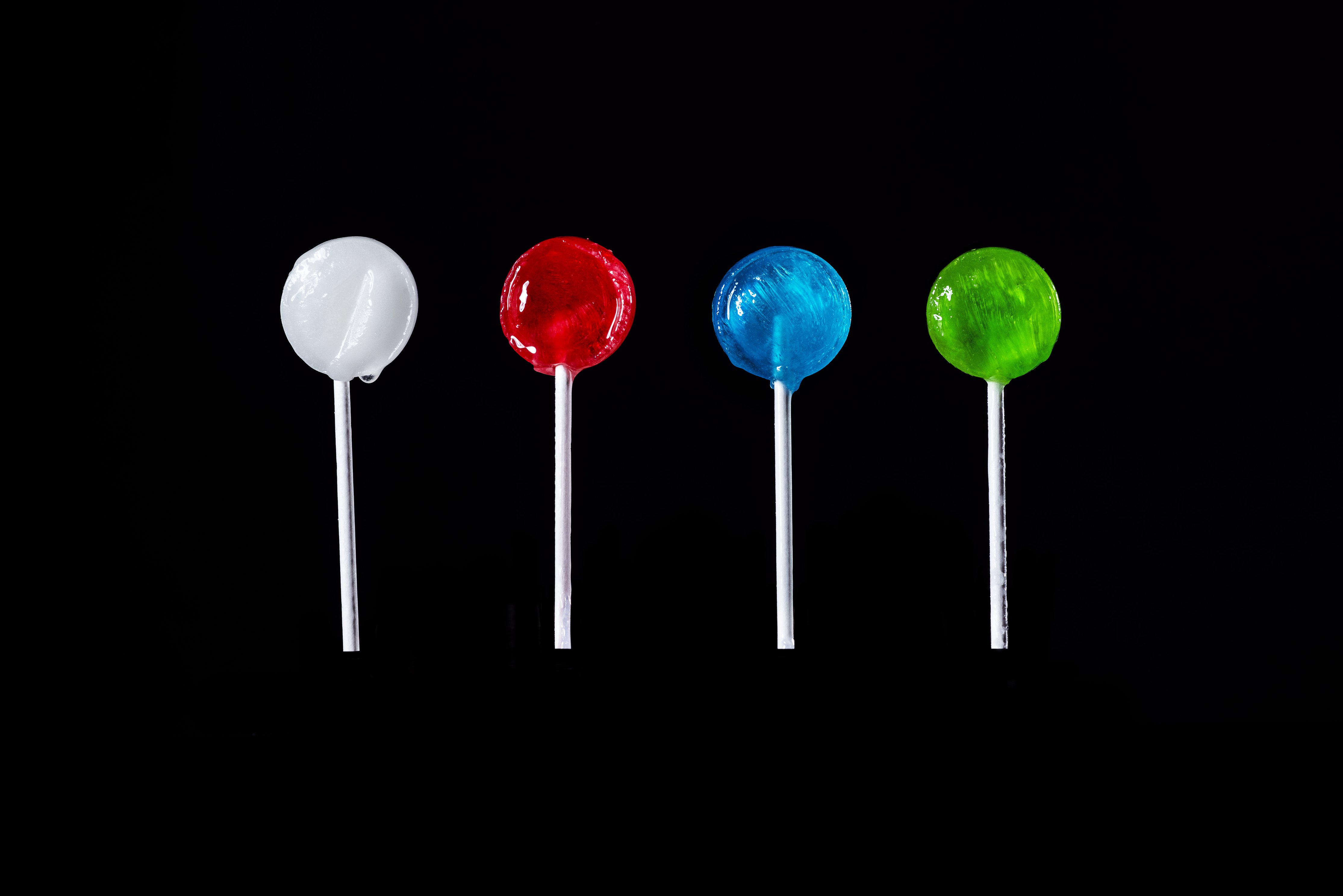 different-colored-lollipops-on-black.jpg