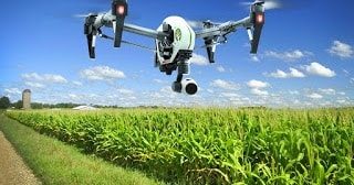 agricultural-drones-over-farm-land-min.jpg