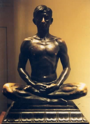 Bronze_statue_of_man_in_half-lotus.jpg