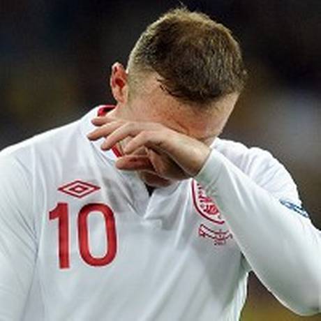 Wayne Rooney was obviously disappointed with England's penalty shoot-out defeat at Euro 2012.jpg