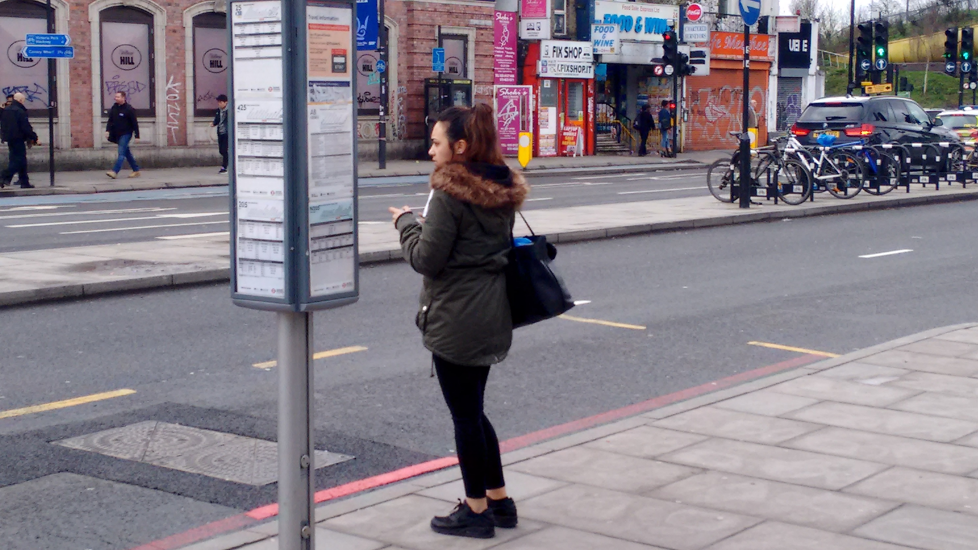 girl_waiting_at_mile_end.jpg