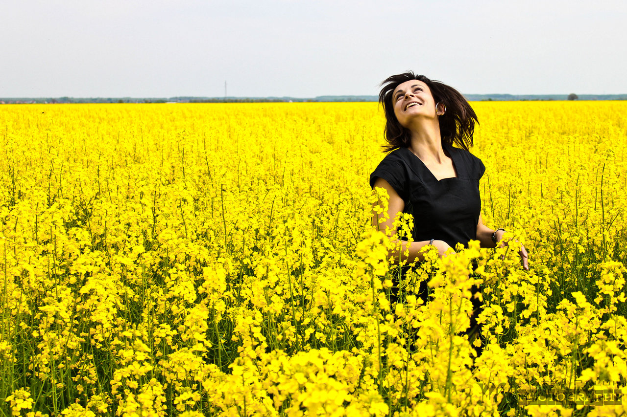 happy_young_woman_in_the_yellow_field_by_matejpaluh-d5r2070.jpg