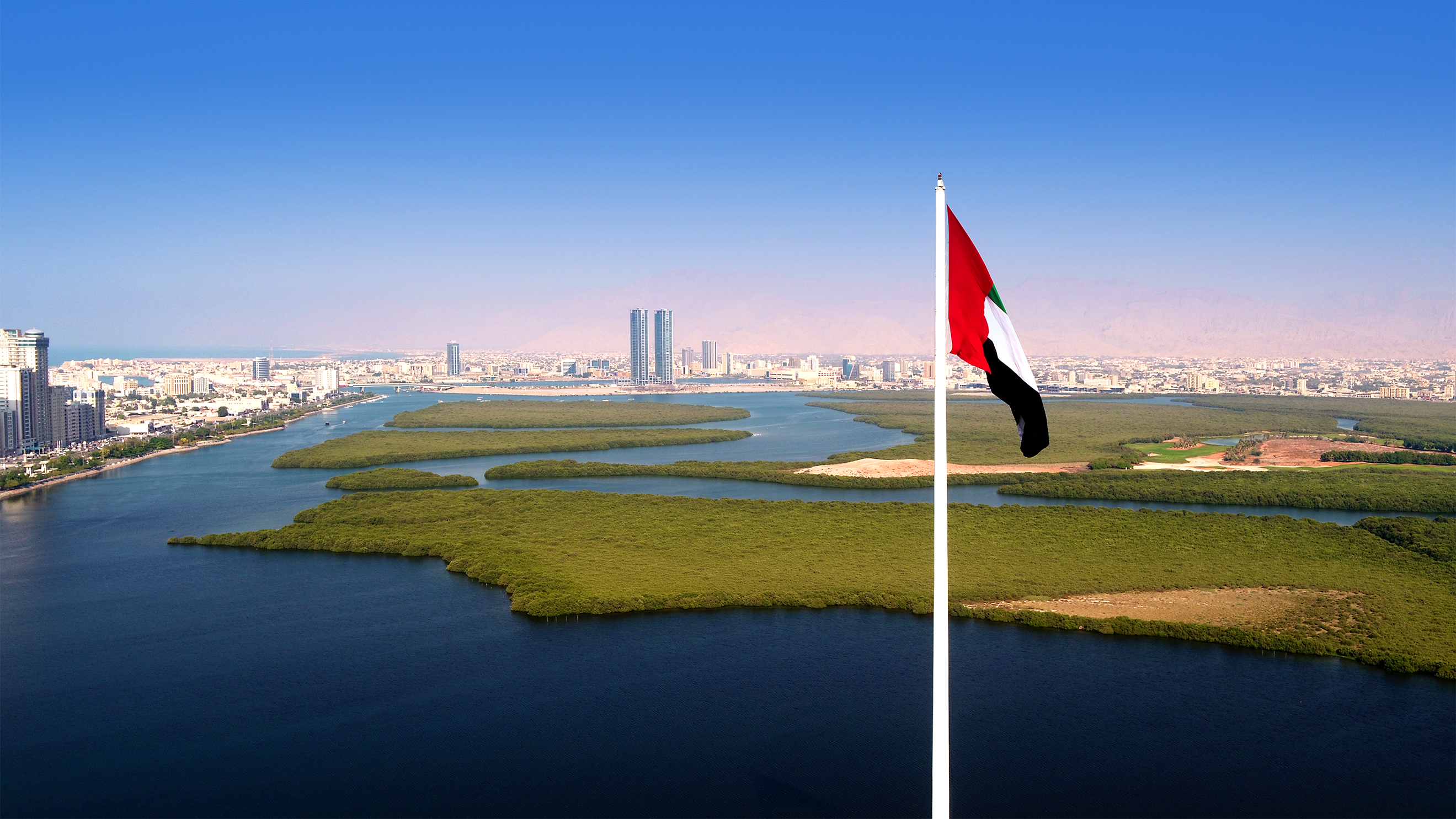 aerial_view_of_rak_city_from_al_qawasim_corniche_flagpole.jpg