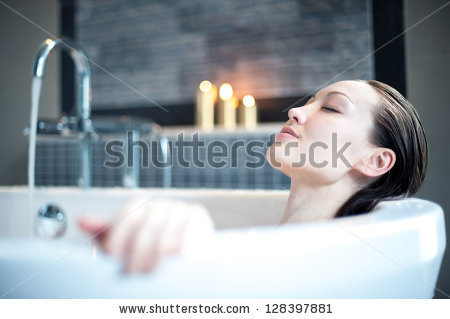 stock-photo-attractive-mixed-asian-woman-relaxing-in-bath-128397881.jpg