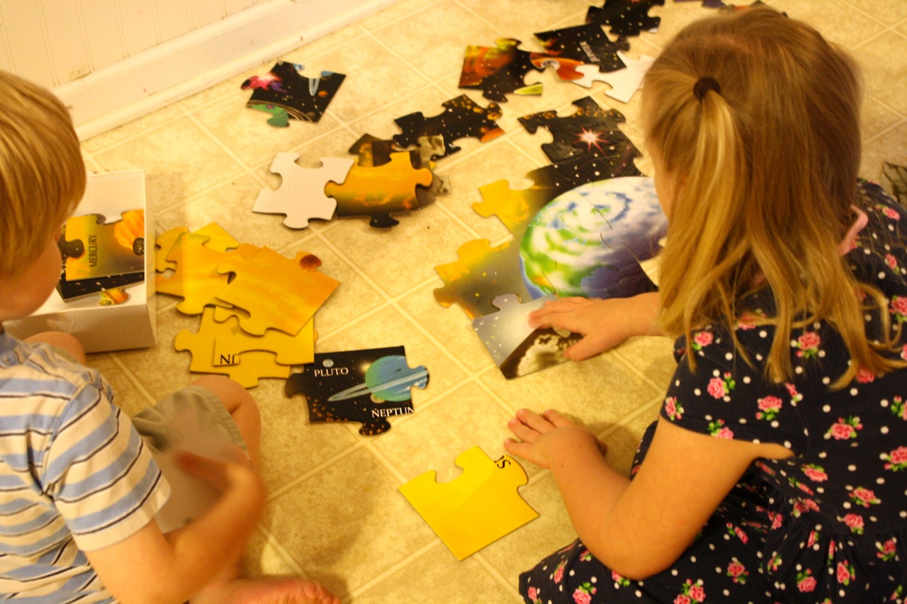 young-children-working-puzzle.jpg