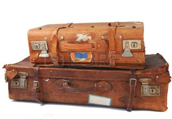 7151323-vintage-weathered-leather-suitcasess-on-top-of-eachother.jpg