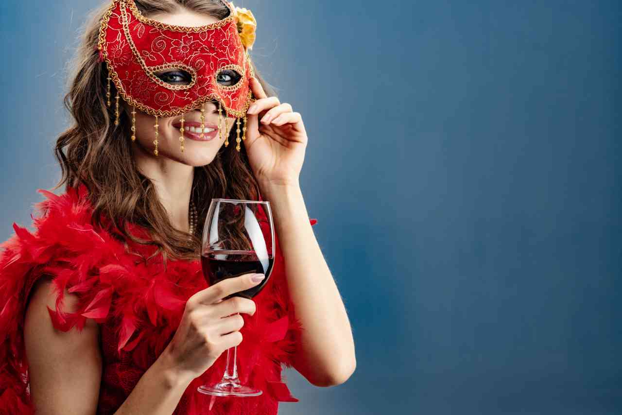 smiling-mystery-woman-in-a-red-carnival-mask-and-b-2022-12-16-11-38-38-utc_s.jpg