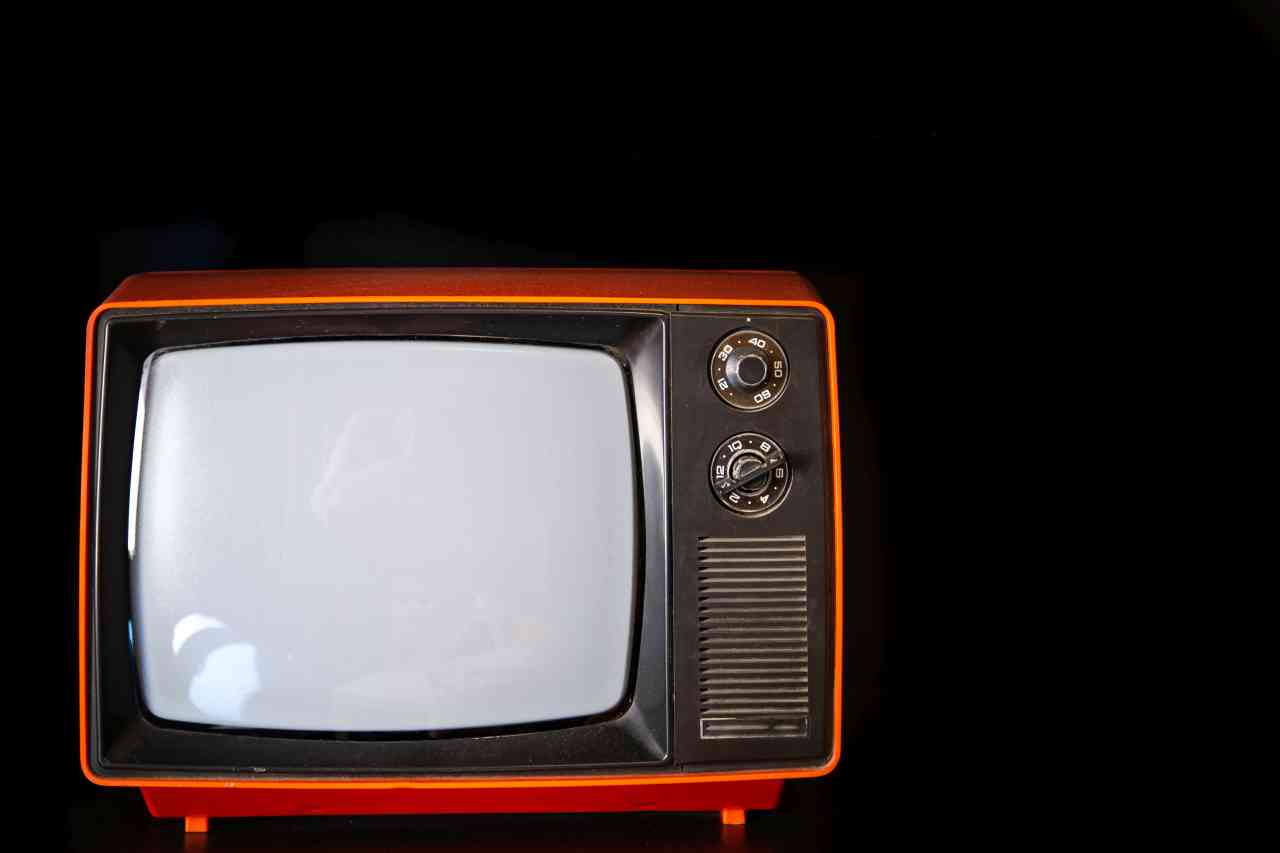 vintage-old-tv-close-up-in-a-dark-room-2021-09-03-13-39-19-utc_s.jpg