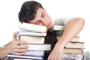 student-sleeping-on-books-ProductiveMuslim.jpg