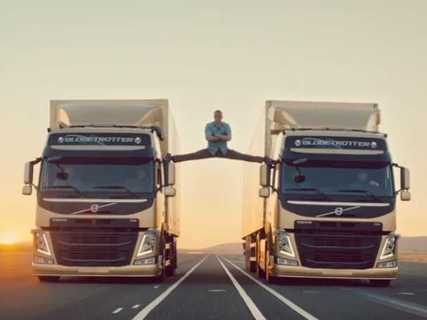 jean-claude-van-damme-did-a-crazy-split-standing-on-2-trucks-for-a-volvo-ad-video.jpg