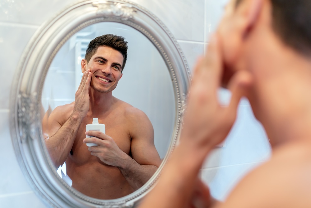 happy-handsome-man-shaving-2023-11-27-05-35-07-utc.jpg