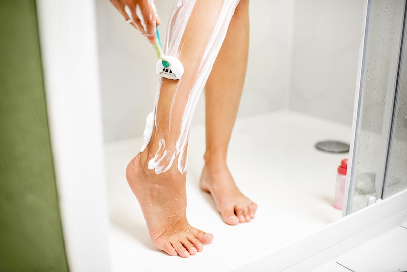 woman-shaving-legs-in-the-shower-2023-11-27-05-25-22-utc.jpg