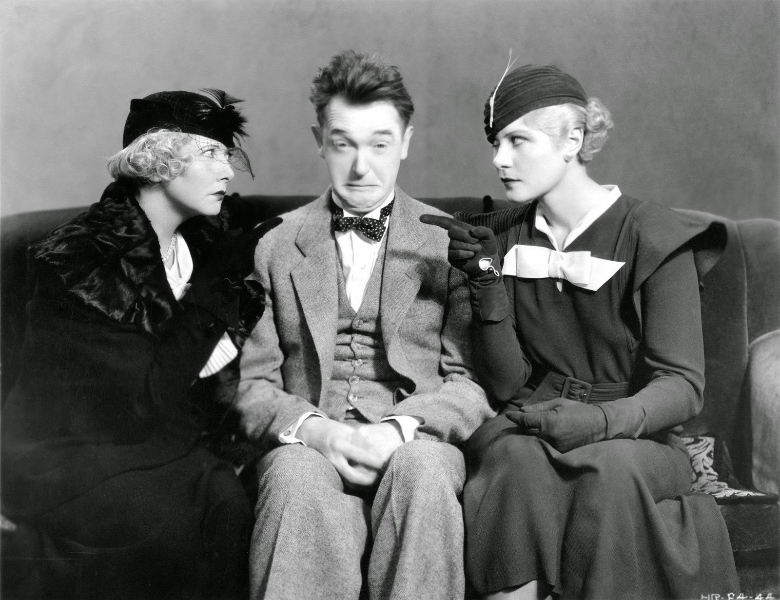 mae_busch_stan_laurel_and_dorothy_christy_in_sons_of_the_desert_1933.jpg