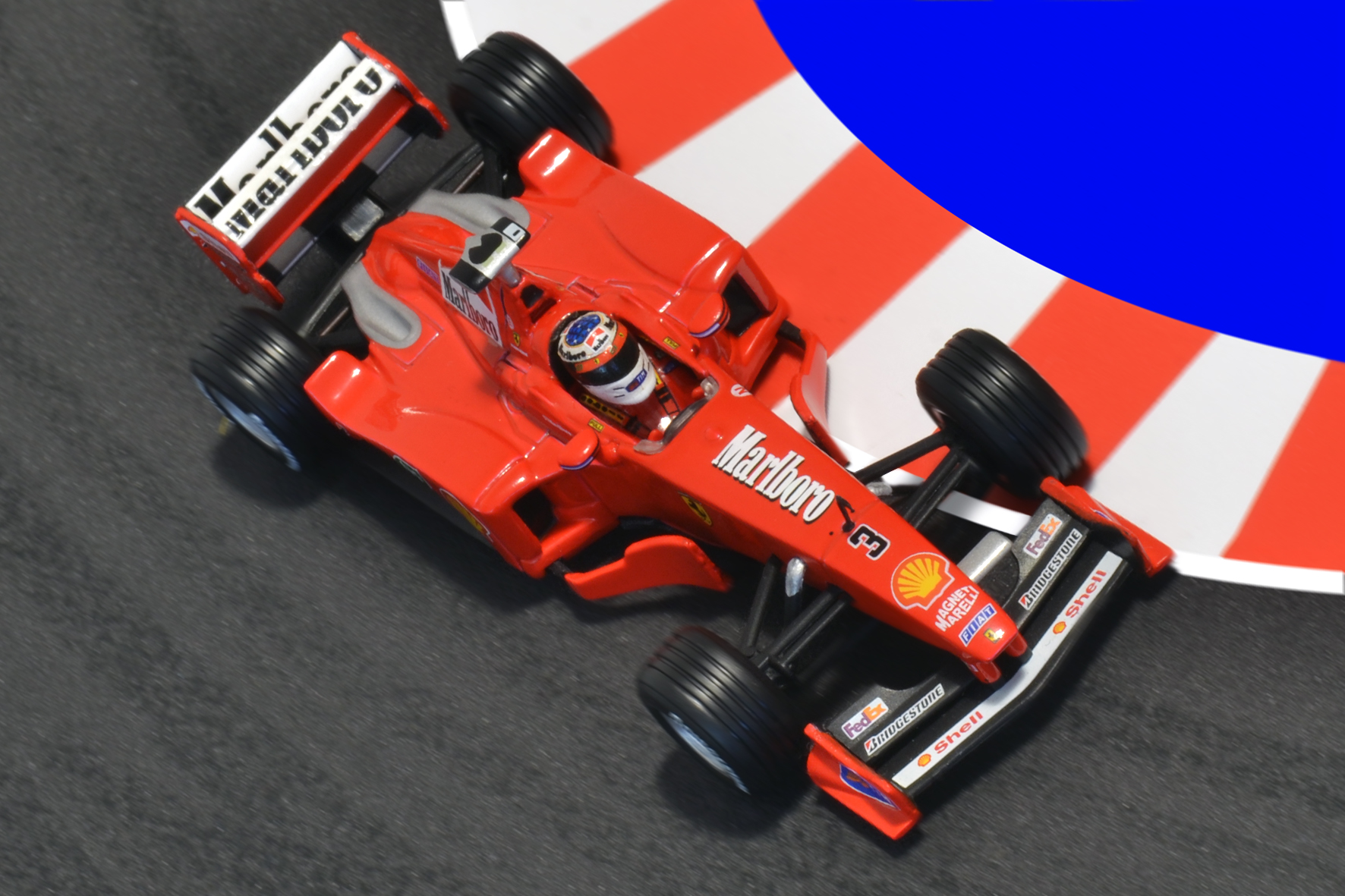 Év:1999<br />Modell: F399<br />Pilóta: Michael Schumacher<br />Gyártó: Hot Wheels