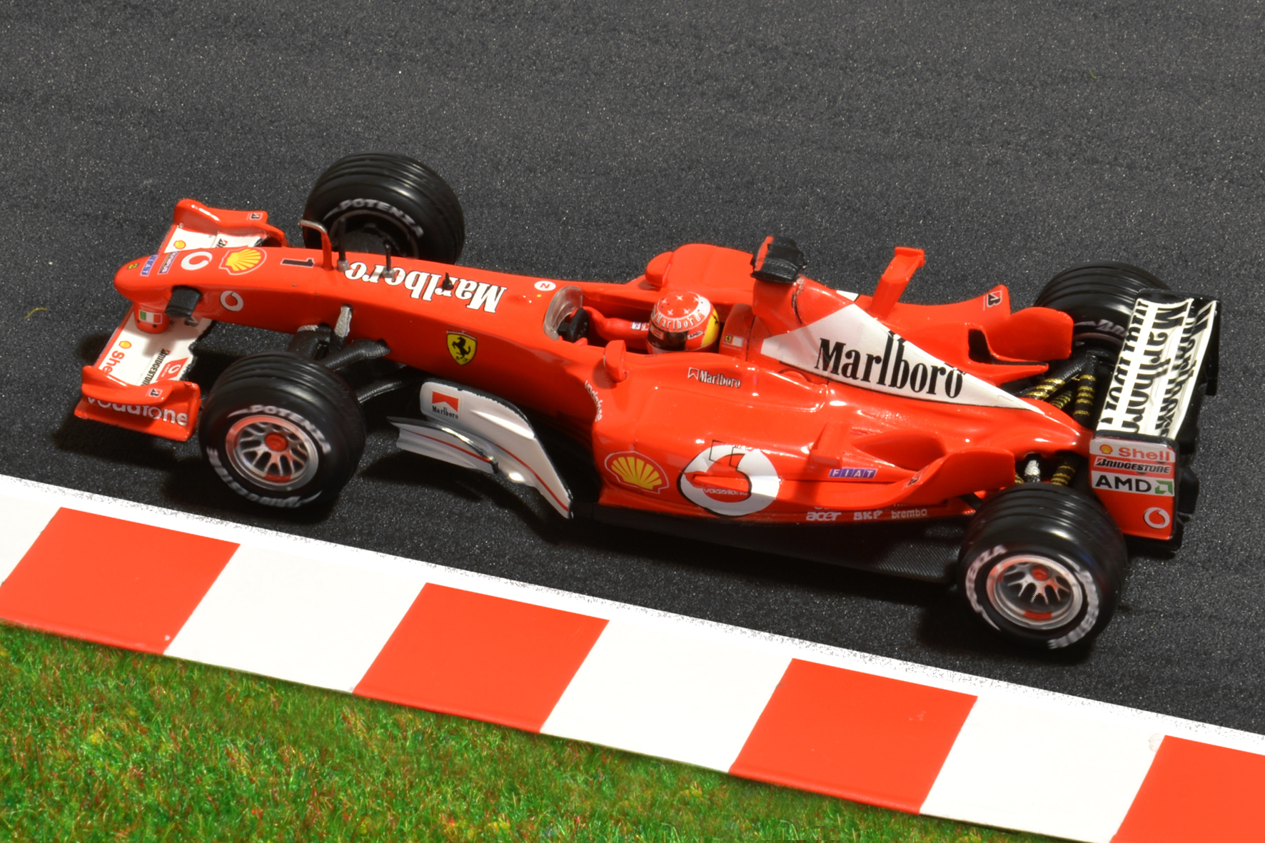 Év:2003<br />Modell: F2003-GA<br />Pilóta: Michael Schumacher<br />Gyártó: Hot Wheels
