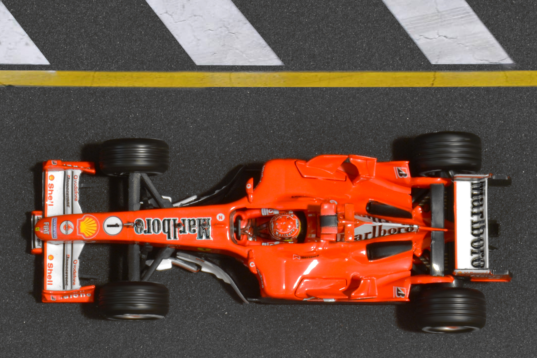 Év:2005<br />Modell: F2005<br />Pilóta: Michael Schumacher<br />Gyártó: Hot Wheels