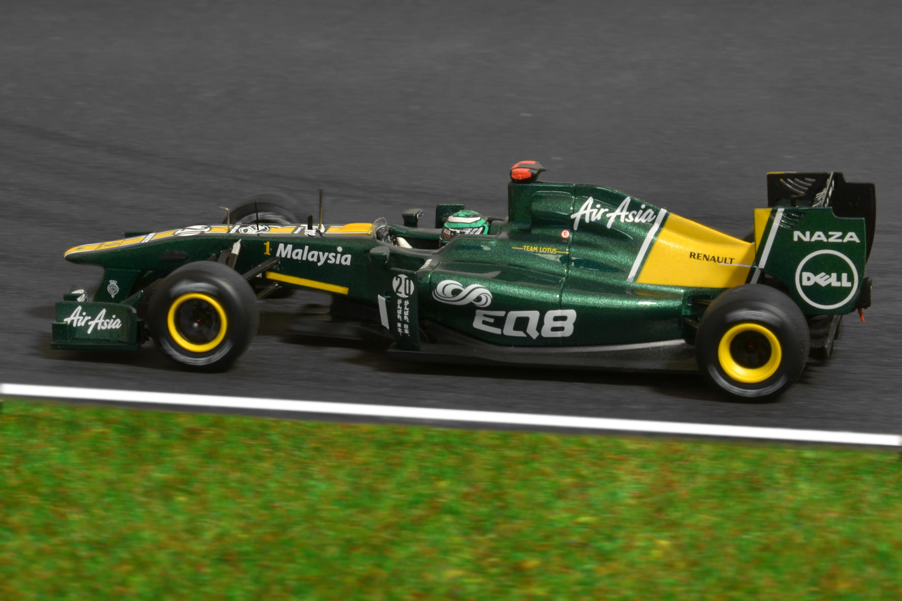 Lotus T128 Heikki Kovalainen 2011 - Spark 1:43