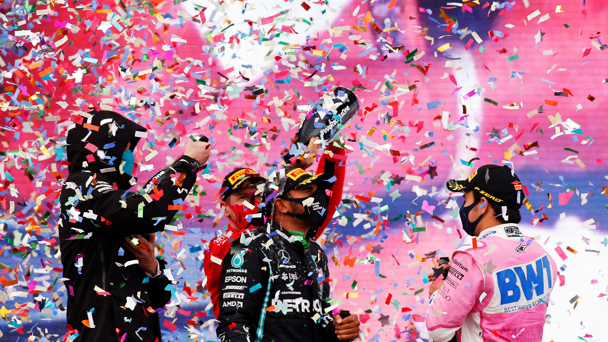 toto-wolff-sebastian-vettel-and-sergio-perez-spray-lewis-hamilton-with-champagne-on-the-istanbul-park-podium-after-the-2020-f1-turkish-grand-prix.jpg