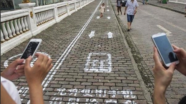 first-mobile-phone-sidewalk.png