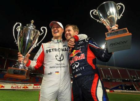 vettel - schumi roc2012.jpg