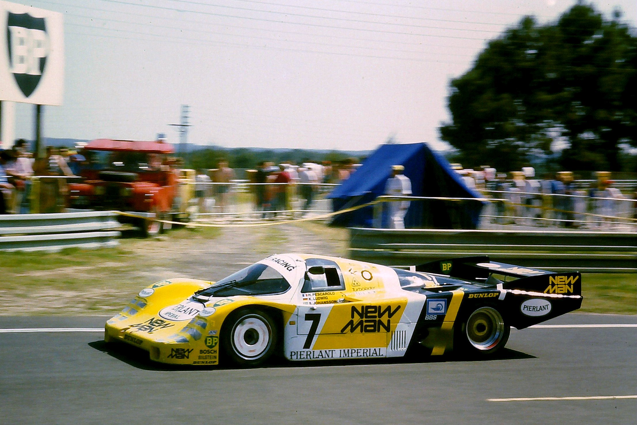 porsche-956-winners-henri-pescarolo-klaus-ludwig-at-the-esses-at-le-mans-1984.jpg