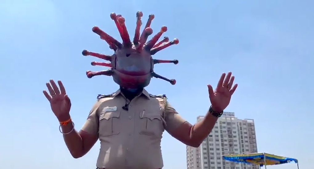 police-inspector-in-india-wears-coronavirus-helmet.jpg