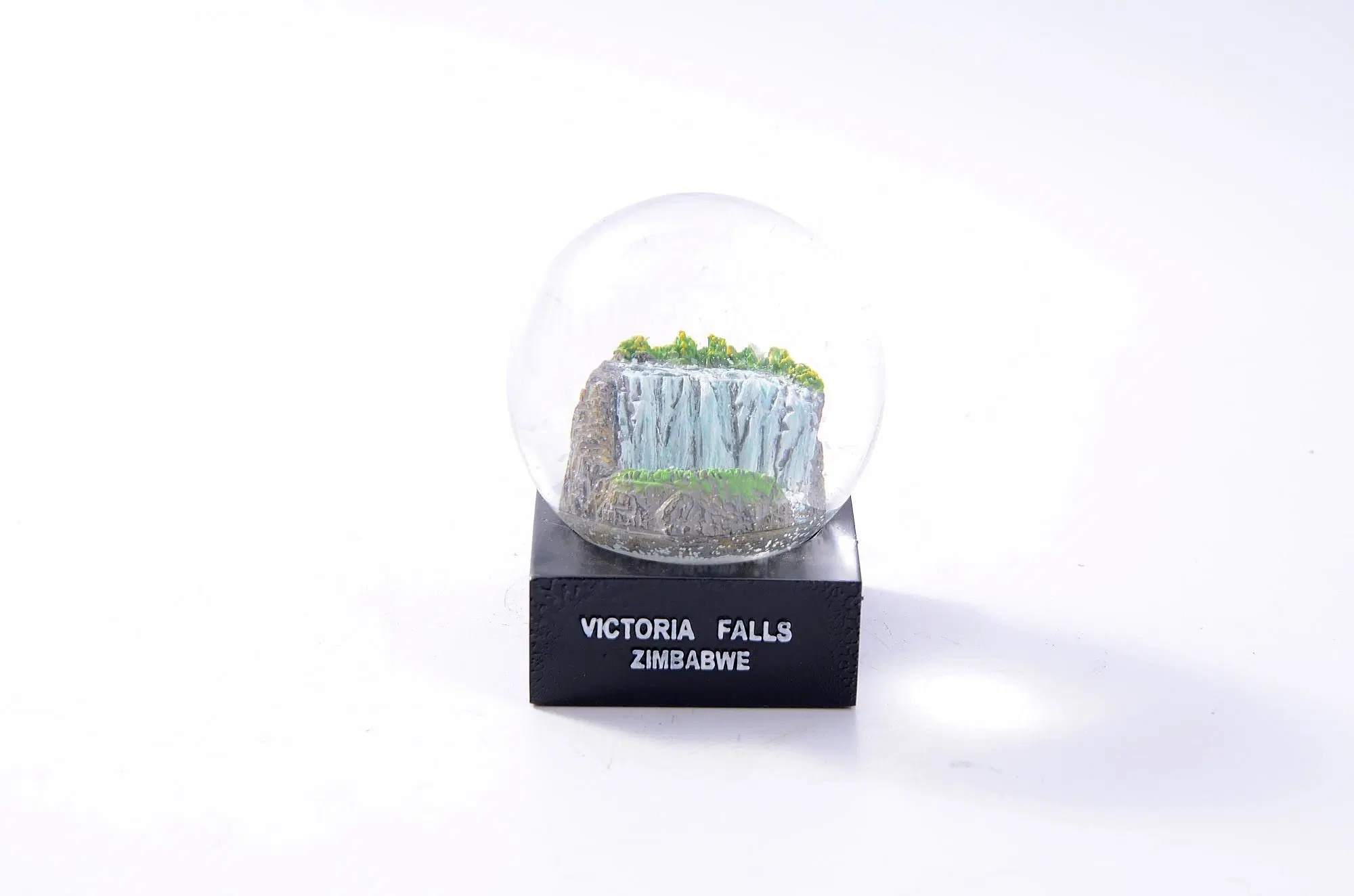 resin-charm-custom-vintage-falls-zimbabwe-snow-globe-music-snow-globes-resin-art.webp