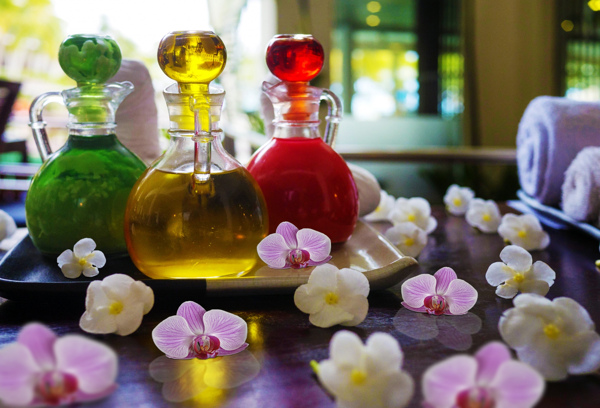 massage-oils-nestled-in-orchids.jpg