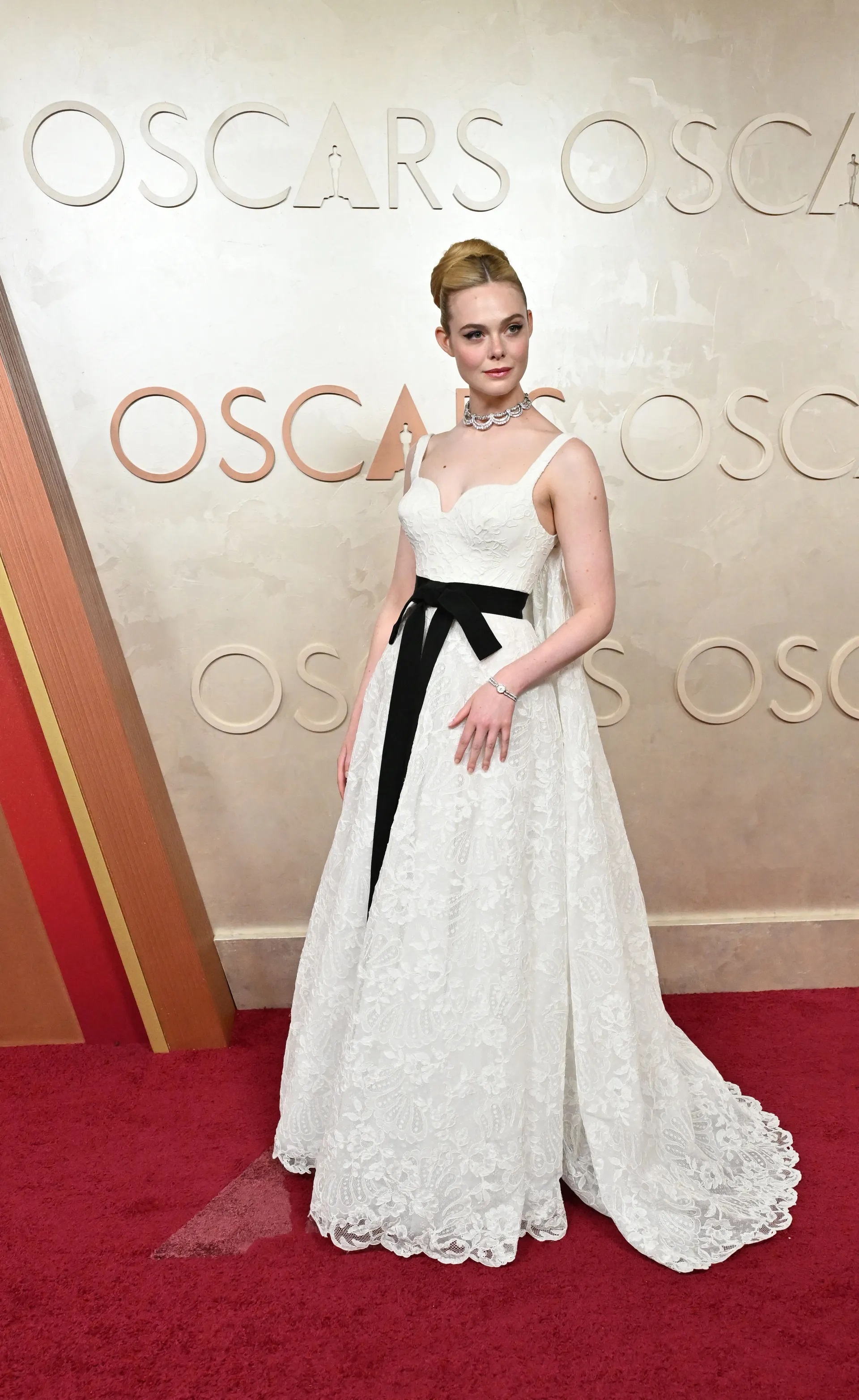 elle_fanning_in_givenchy_by_sarah_burton_hubert_1st_collection_1st_person_sb_dress_cartier.jpg