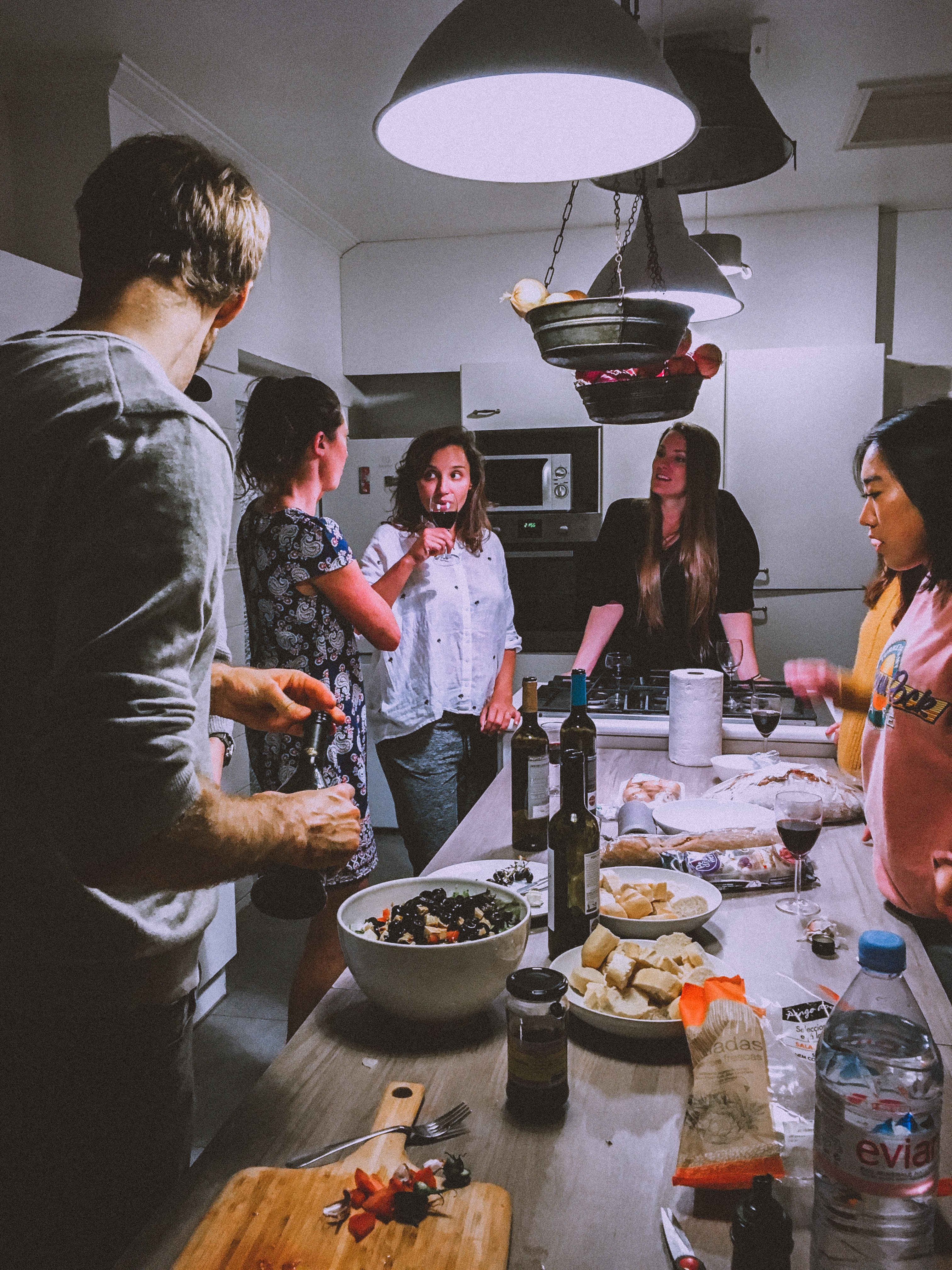 men-and-women-standing-infront-of-dining-table-1655329.jpg