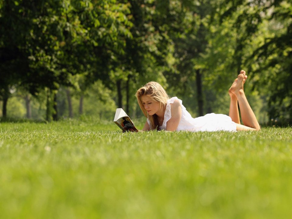 girl-reading-book-field.jpg