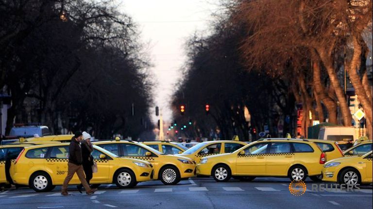 taxis-block-a-main-road.jpg