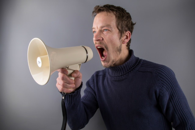 man-with-a-megaphone-1467099535usq_red.jpg