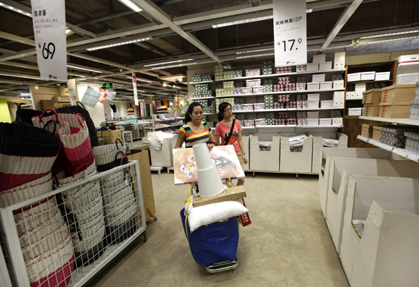 3 a-customer-pushes-a-shopping-cart-at-the-11-furniture-store-in-kunming-southwest-chinas-yunnan-province1.jpg