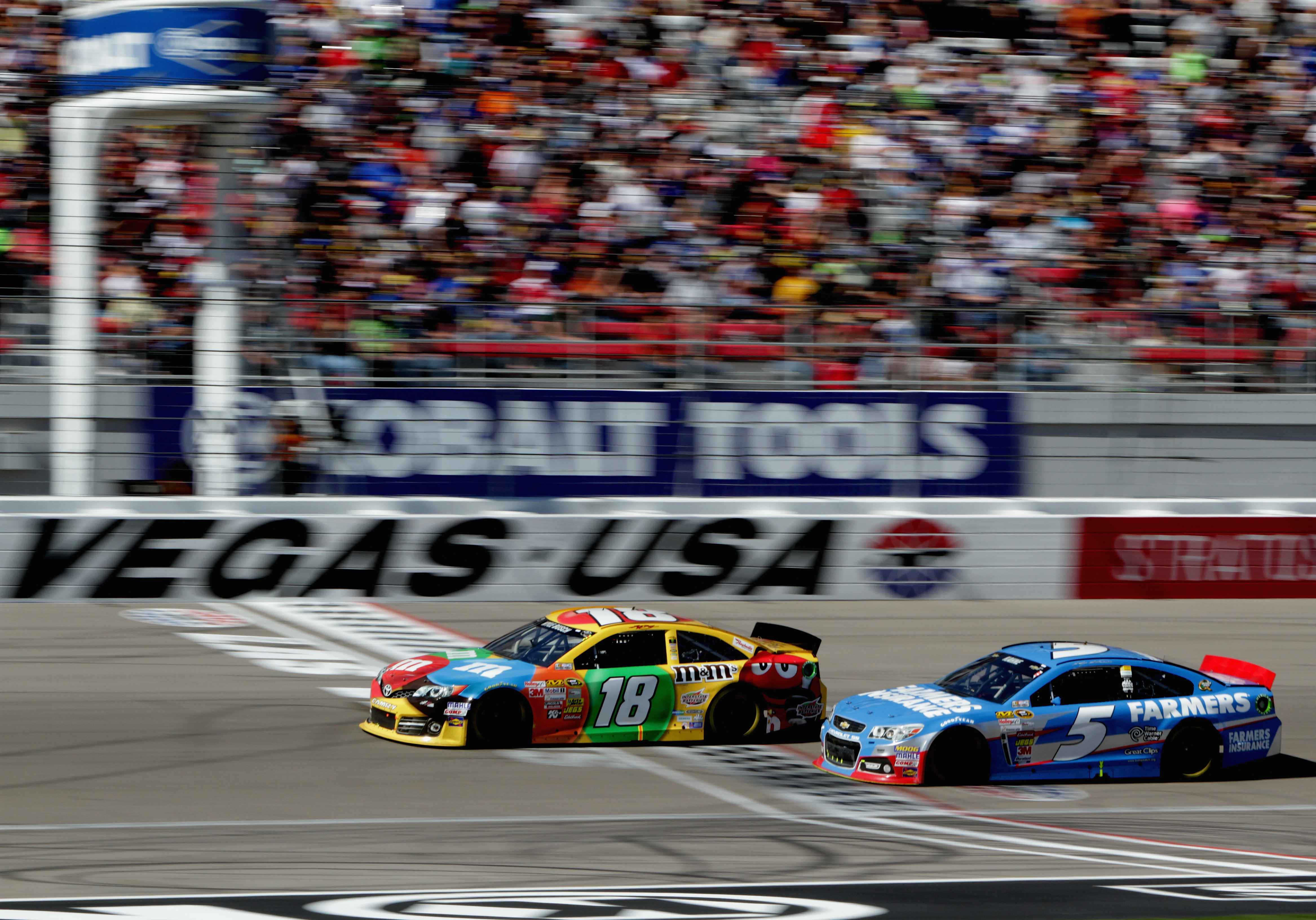 nascar_nscs_kobalt400_kyle_busch_kasey_kahne_031013.jpg