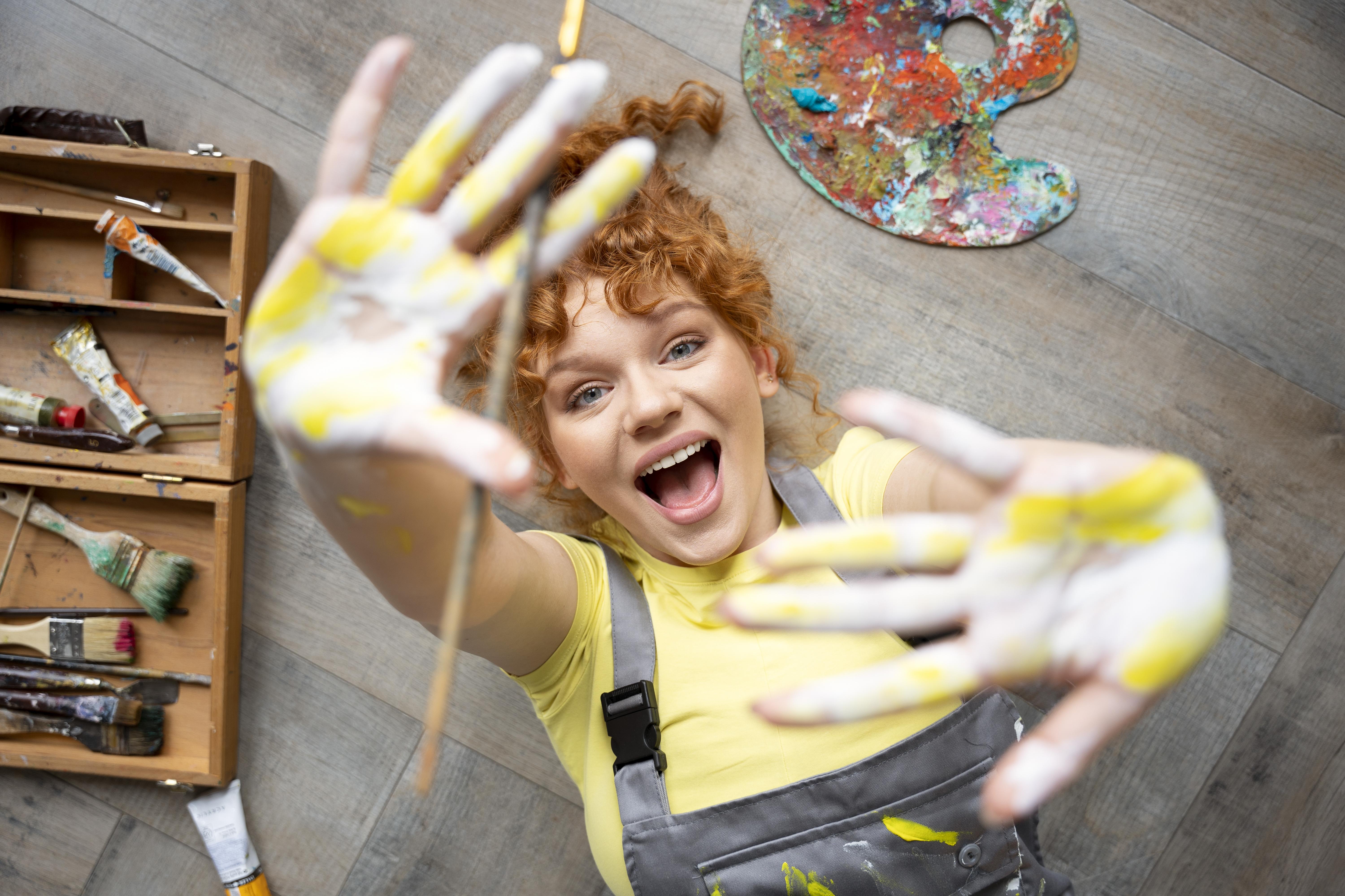 medium-shot-woman-with-paint-hands.jpg