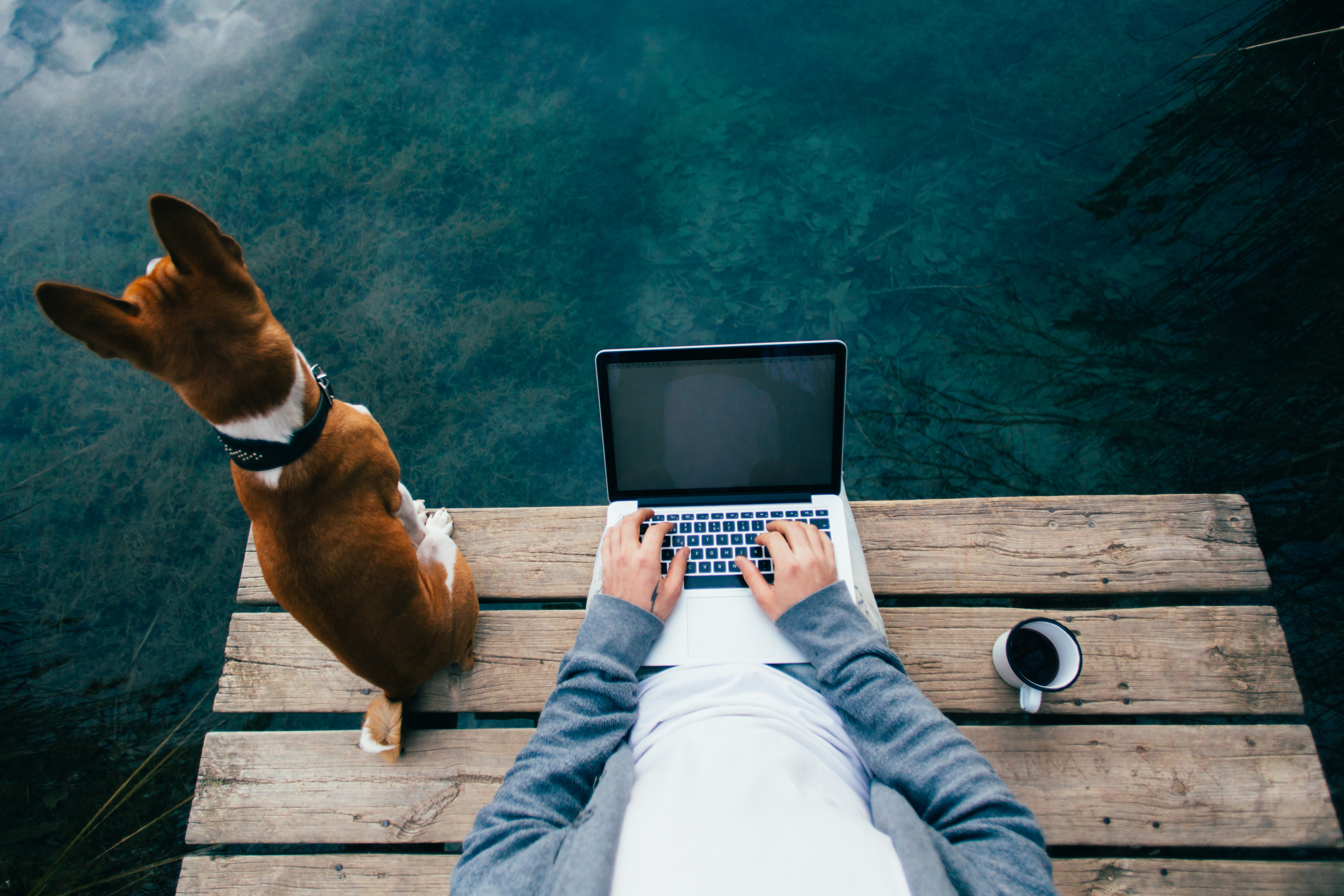 pov-man-drink-coffee-work-laptop-lake.jpg