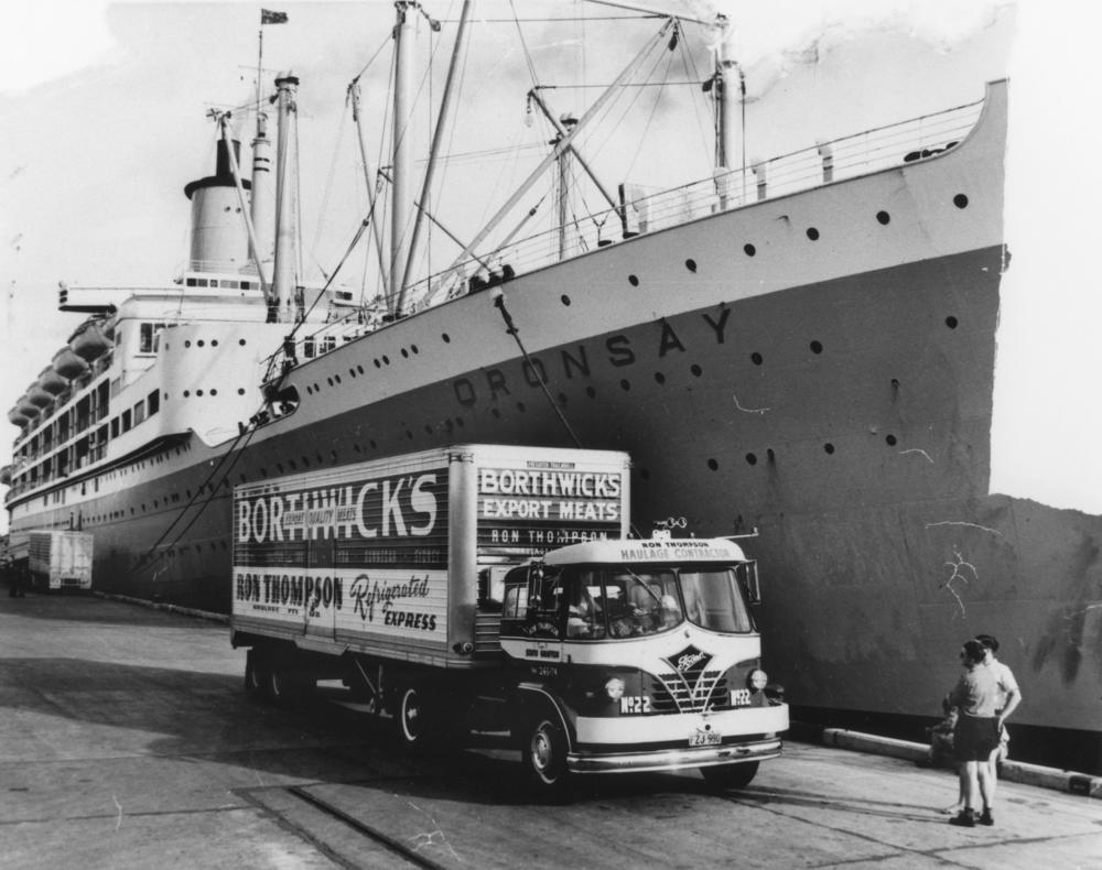 StateLibQld_1_137220_Borthwick's_export_meat_truck_alongside_the_Oransay_at_a_Brisbane_wharf.jpg