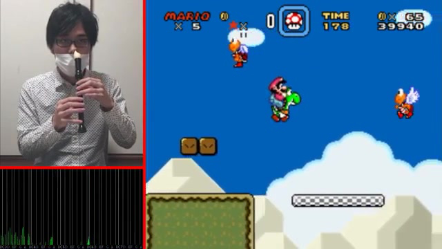 Orrával játszik Super Mario Worldöt egy japán férfi