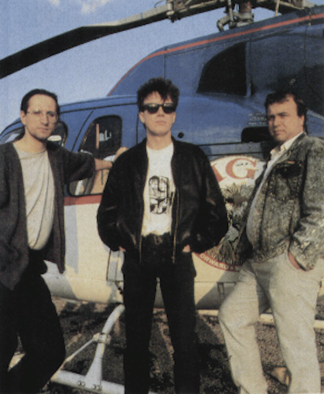 the-bitmap-brothers-standing-by-robert-maxwells-helicopter.png