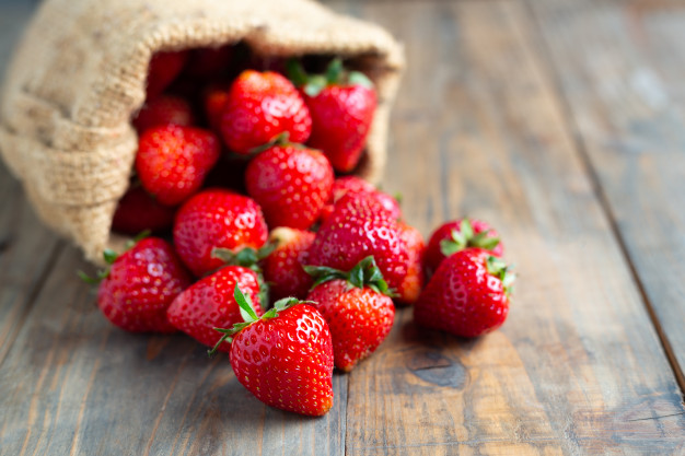 fresh-strawberries-wooden-table_1150-8054.jpg