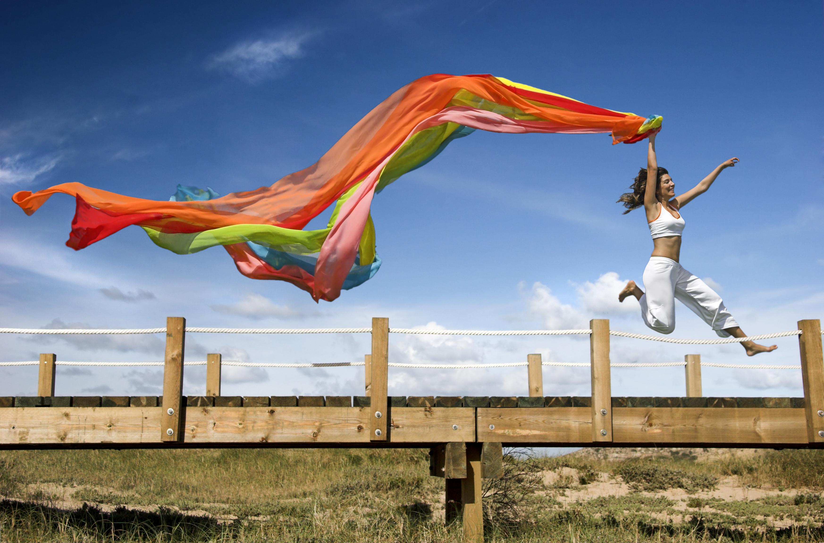 Jumping-Woman-with-large-scarf.jpg