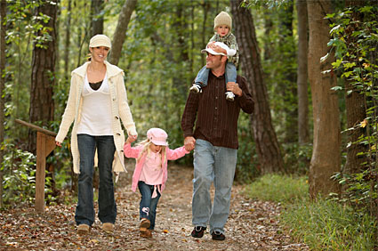 family_walking_in_woods.jpg