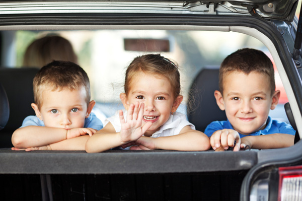 happy-kids-in-back-of-car.jpg