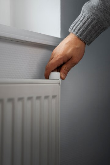 man-turning-off-radiator-during-energy-crisis_23-2150061814.jpg