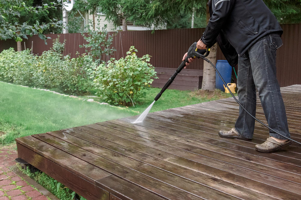 man-cleaning-walls-floor-with-high-pressure.jpg