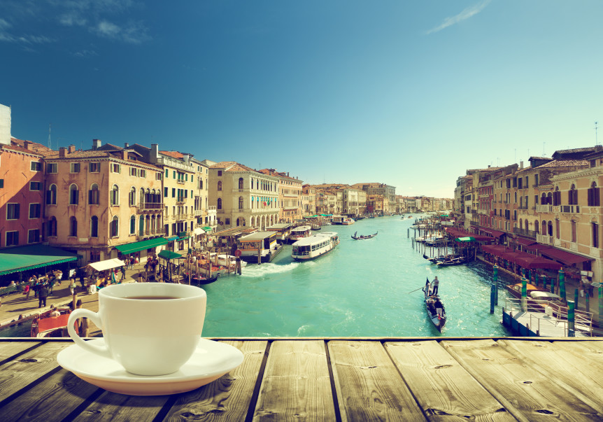 bigstock-coffee-on-table-and-venice-in-69264268-862x603.jpg